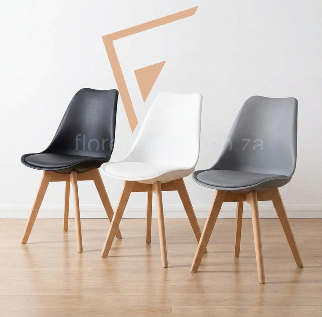 Set of three Nordic dining chairs in black, white, and grey arranged together.